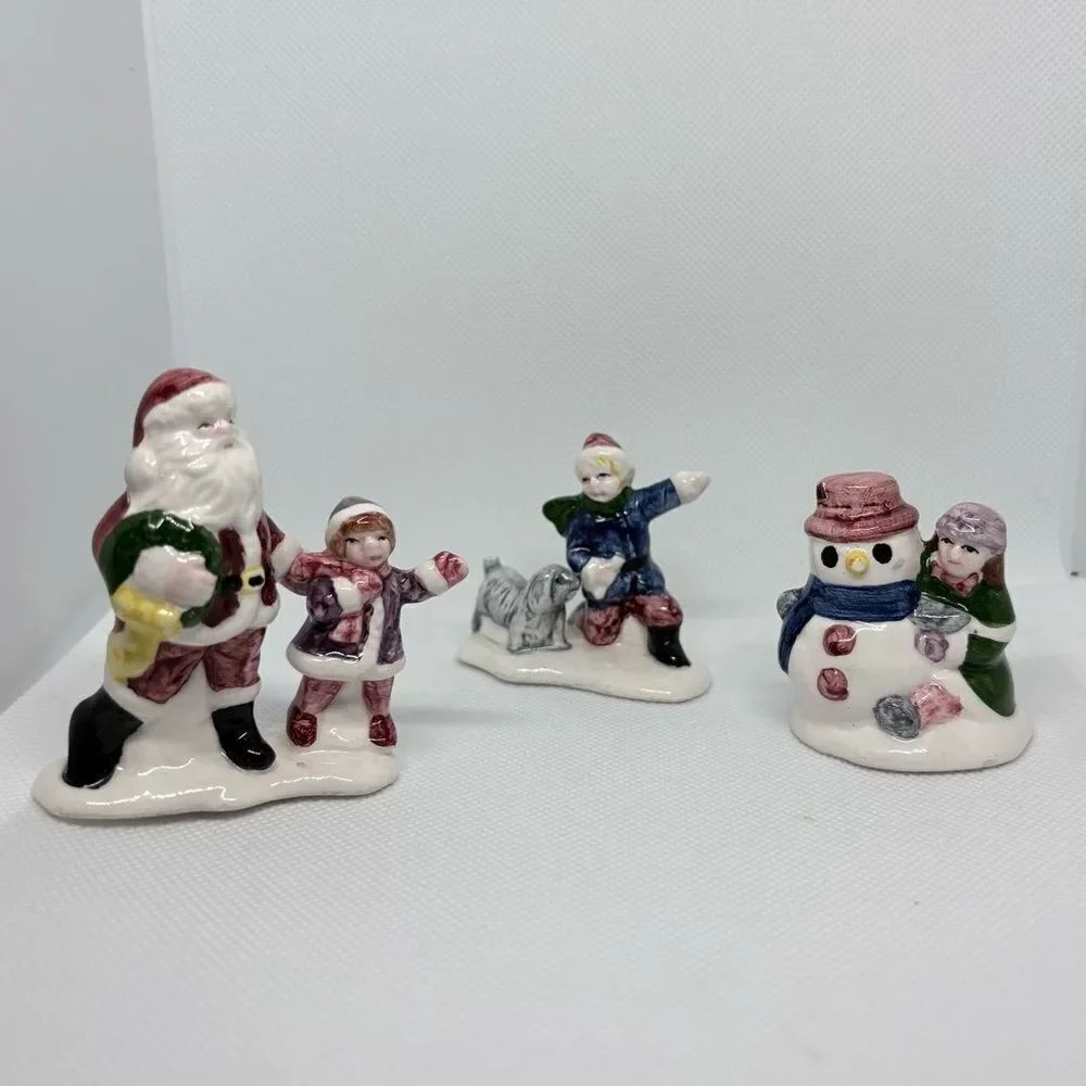 Festive Ceramic Figurine Set perfect for a Holiday Village